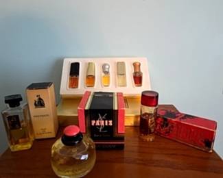 Assorted Vintage Perfume Miniatures and Bottles including YSL Paris, Lanvin Pretexte, and Estée Lauder