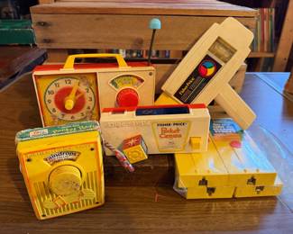 Fisher-Price Vintage Toy Collection: Hickory Dickory Dock Clock Radio, Pocket Radio, Pocket Camera, and Raindrops Toy
