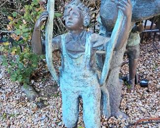 Bronze Sculpture of Four Children Playing in a Tree