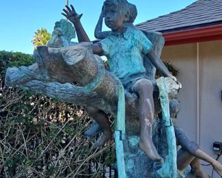 Bronze Sculpture of Four Children Playing in a Tree