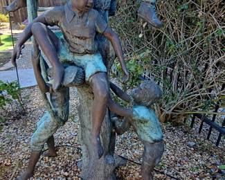 Bronze Sculpture of Four Children Playing in a Tree