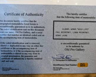 Signed album with Certificate of Authenticity