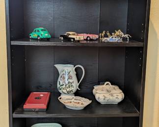More decorative items, toy cars, vintage dominoes