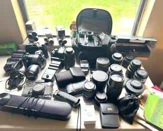 Canon, Olympus, and more! Cameras, lenses, filters!