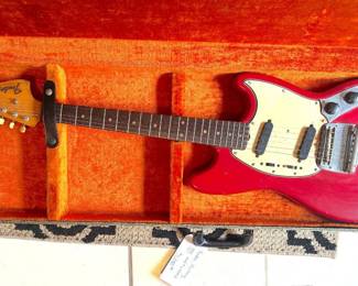 YES! It's a 1964 Mustang in original case!