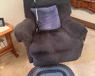 Blue Recliner $25. Damage on left arm