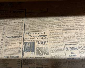 This is the factory installed Antique newsprint lining of the dresser drawers! Never seen this before!