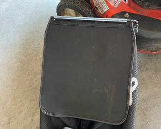 The ARIENS mower has TWO grass catching units AND aplug for the opening if you don't want to use them...