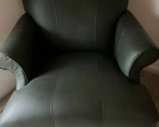 LA-Z-Boy Furniture perfection! This beautiful forest green leather chair is stunning ...SO comfortable and welcoming! This color is such that it is almost neutral, could go with SO many decors...The leather covers the feet, too, No wooden legs sticking out of this lovely piece...it is like new!