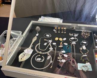 Fine jewelry and costume and sterling flatware 