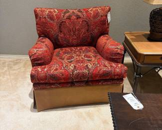 Club chair with leather skirt
