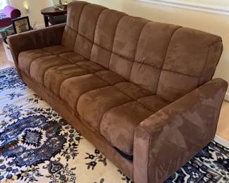 Brown Fabric Sofa with Futon Functionality