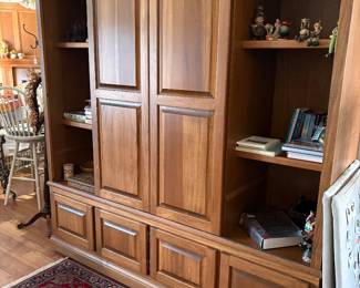 79” wide, 24” deep, 8 ft tall. We think it’s 2 pieces
