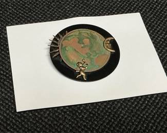 90's era brooch
