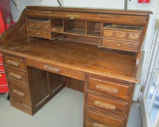 This is located in the Workshop.  Beautiful Roll Top Desk
