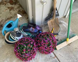 Assortment of Outdoor Tools including Trowel Hose Nozzle Shovel and Rake and More