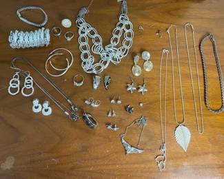 Collection of Silvertone Jewelry including Rings Necklaces Earrings and Bracelets