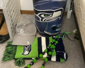 Seattle Seahawks Scarf with Kukui Nut Lei Trash Can and Mariners Hat