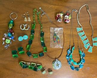 Collection of Green Jewelry including Necklaces Earrings and Keychain