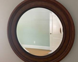 Large round beveled mirror. 