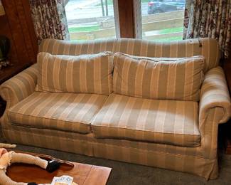 1990’s overstuffed striped couch in tan and blue. 