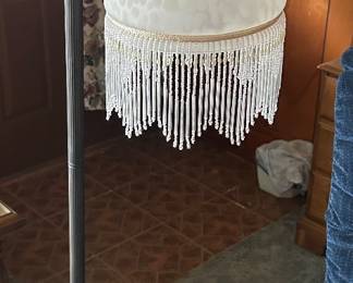 Vintage Tiffany stand lamp with glass n fringe beaded shade. 