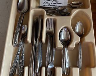 1847 Rogers Brothers Wildflower pattern. 8 each dinner forks, sal forks, teaspoons, soup spoons, table knives, serving  utensils plus a mix of extras of ice tea spoons, baby spoons 