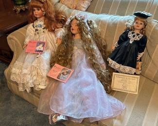 Porcelain dolls with certificates of ownership 