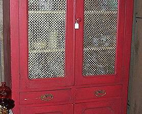Red primitive cupboard