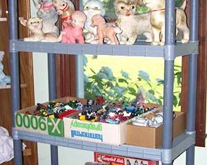 Children's toys including dish sets, die cast cars, 1960's squeaker toys and more