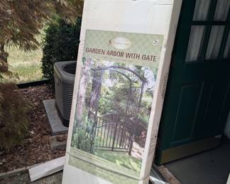 R107 - $50. Garden Arbor with Gate - new in box.