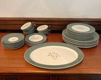 R86 - $60. Syracuse China "Splendor". 6 dinner plates, 6 saucers, 6 dessert plates, 7 salad plates, 5 cups ,1 serving platter.