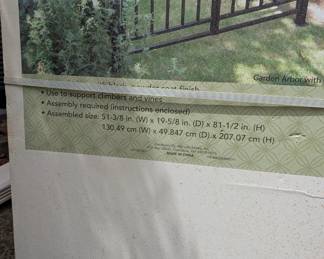 R107 - $50. Garden Arbor with Gate - new in box.