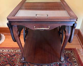 R52 - $175. Drop Leaf Tea Cart with Removable Glass Top Tray. Measures 35" with leaves up x 29" x 27" tall.