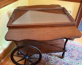 R52 - $175. Drop Leaf Tea Cart with Removable Glass Top Tray. Measures 35" with leaves up x 29" x 27" tall.