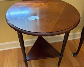 R30 - $50. Bombay Company Triple Drop Leaf Side Table. Measures 20" round x 25.5" tall. Very good vintage condition.