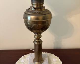 R25 - $175. Electrified Victorian Brass Banquet Lamp with Marble Base. Frosted Glass Shade. Measures 29.5" tall.