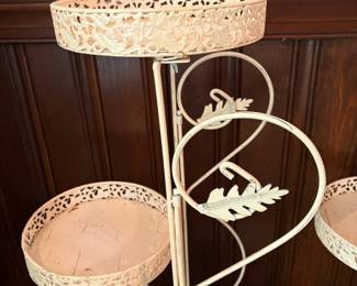 R61 - $30. Pair of 3 Tier Metal Plant Stands. Measures 33" tall.