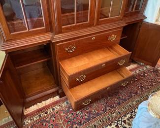 R59 - $250. Kling Lighted China Cabinet. Excellent Condition. Measures 62" wide x 18" deep x 78" tall. Moves in 2 pieces (Base is 30.5")