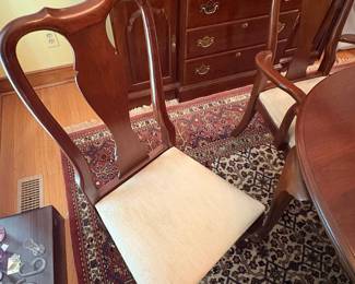 R60 - $600. Knob Creek Dining Table with 2 leaves, 6 chairs & table pad protectors. Excellent condition! Table without leaves is 66" long x 44" wide x 29" tall. 2 - 18" leaves. 2 Captains Chairs. 4 Regular Chairs. All sturdy and solid.