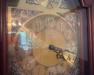 R49 - $500. Howard Miller Grandfather Clock. Works! Measures 21.5" wide x 12" deep x 80" tall.
