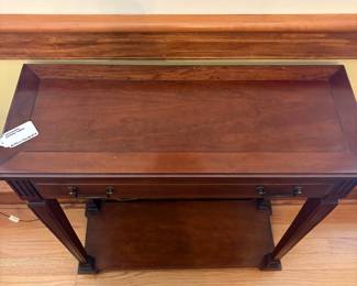 R58 - $60. Hammary Entry Console Table. Measures 27.75" x 11" x 30.25". Excellent Condition.