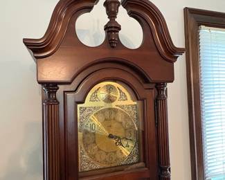 R49 - $500. Howard Miller Grandfather Clock. Works! Measures 21.5" wide x 12" deep x 80" tall.
