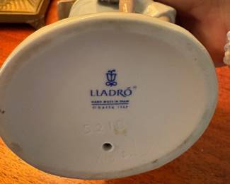 R69 - $15. Lladro 5218 Autumn Girl with Doll.