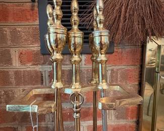 R45 - $40. Brass Fireplace Tools. Measures 32" tall.