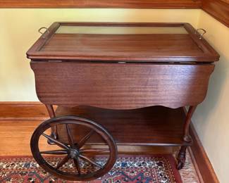 R52 - $175. Drop Leaf Tea Cart with Removable Glass Top Tray. Measures 35" with leaves up x 29" x 27" tall.