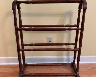 R21 - $25. Quilt Rack. Measures 27.5" x 12.25" x 33.5" tall. Sturdy but has a little wiggle.
