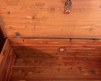 R47 - $150. Lane Cedar Chest on Legs. Good condition, top is faded. Very sturdy. No key. Measures 44" wide x 18" deep x 28" tall.