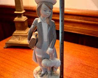 R69 - $15. Lladro 5218 Autumn Girl with Doll.