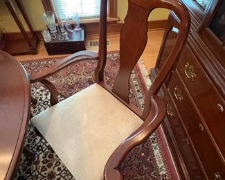 R60 - $600. Knob Creek Dining Table with 2 leaves, 6 chairs & table pad protectors. Excellent condition! Table without leaves is 66" long x 44" wide x 29" tall. 2 - 18" leaves. 2 Captains Chairs. 4 Regular Chairs. All sturdy and solid.